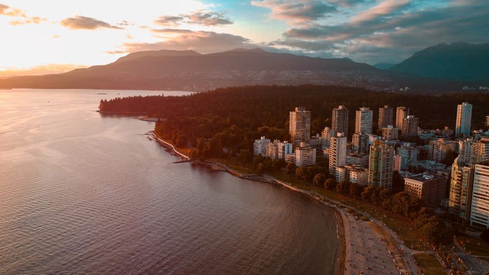 English Bay and the West End skyline at sunset from the air