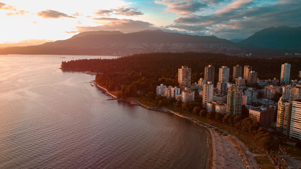 English Bay and the West End skyline at sunset from the air