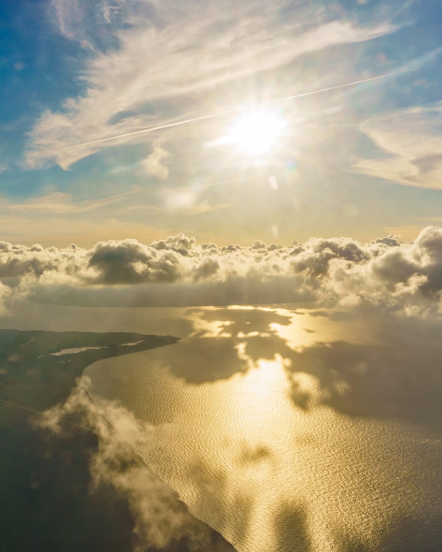 Aerial view over mountains and coast