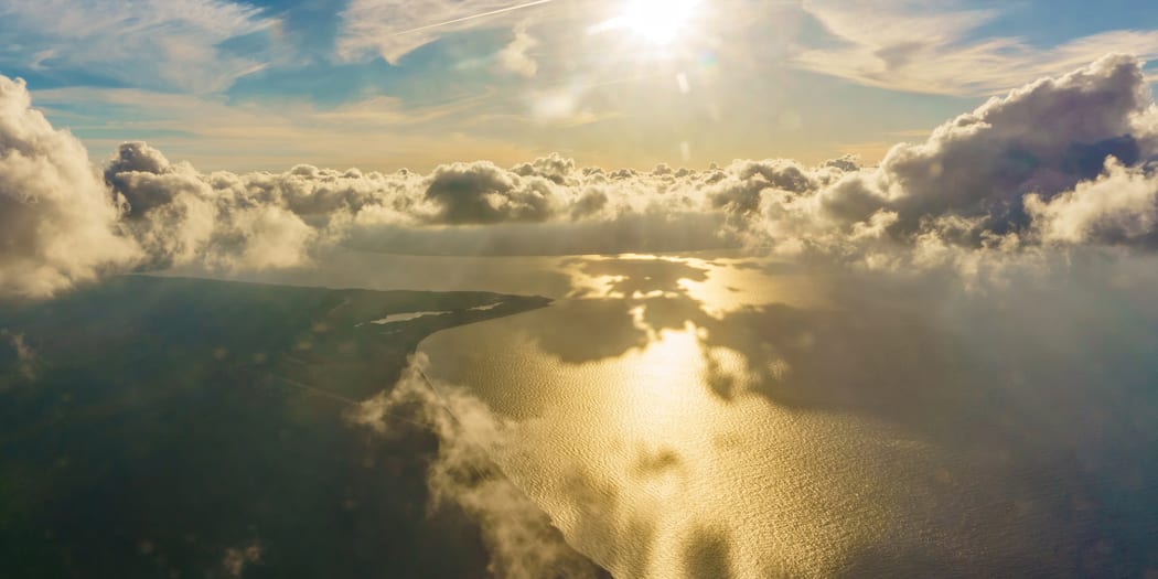 Aerial view over mountains and coast