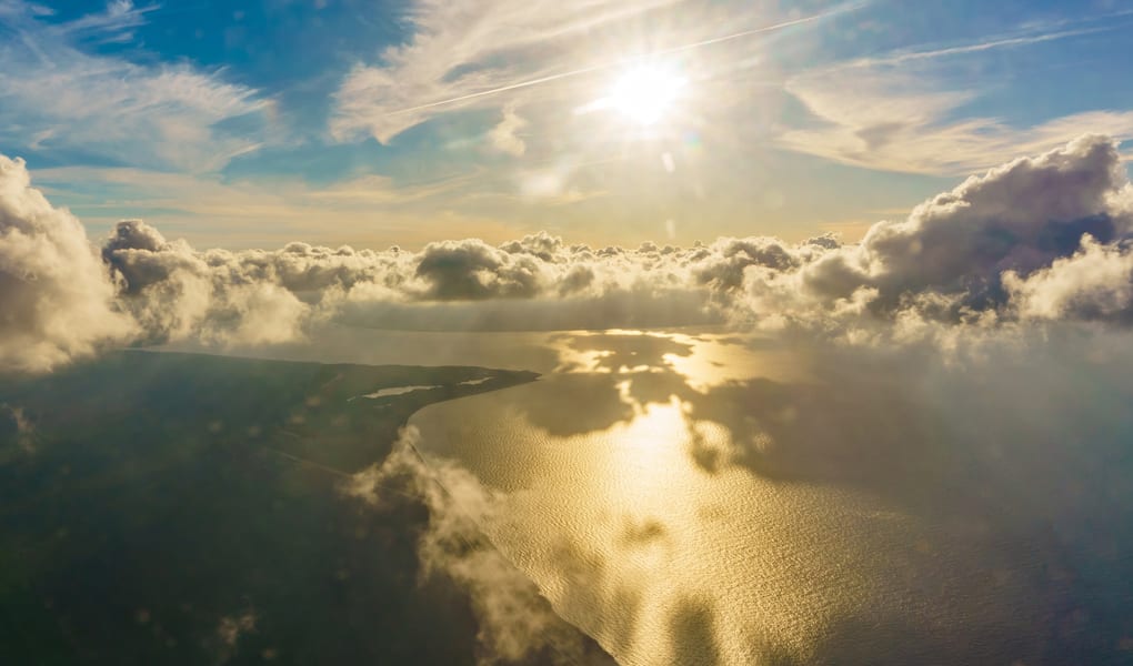 Aerial view over mountains and coast