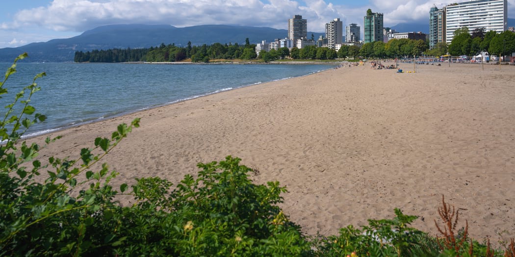 English Bay and the West End skyline at sunset from the air