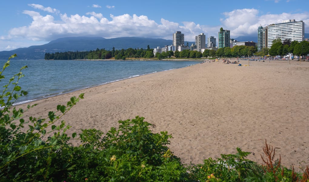 English Bay and the West End skyline at sunset from the air