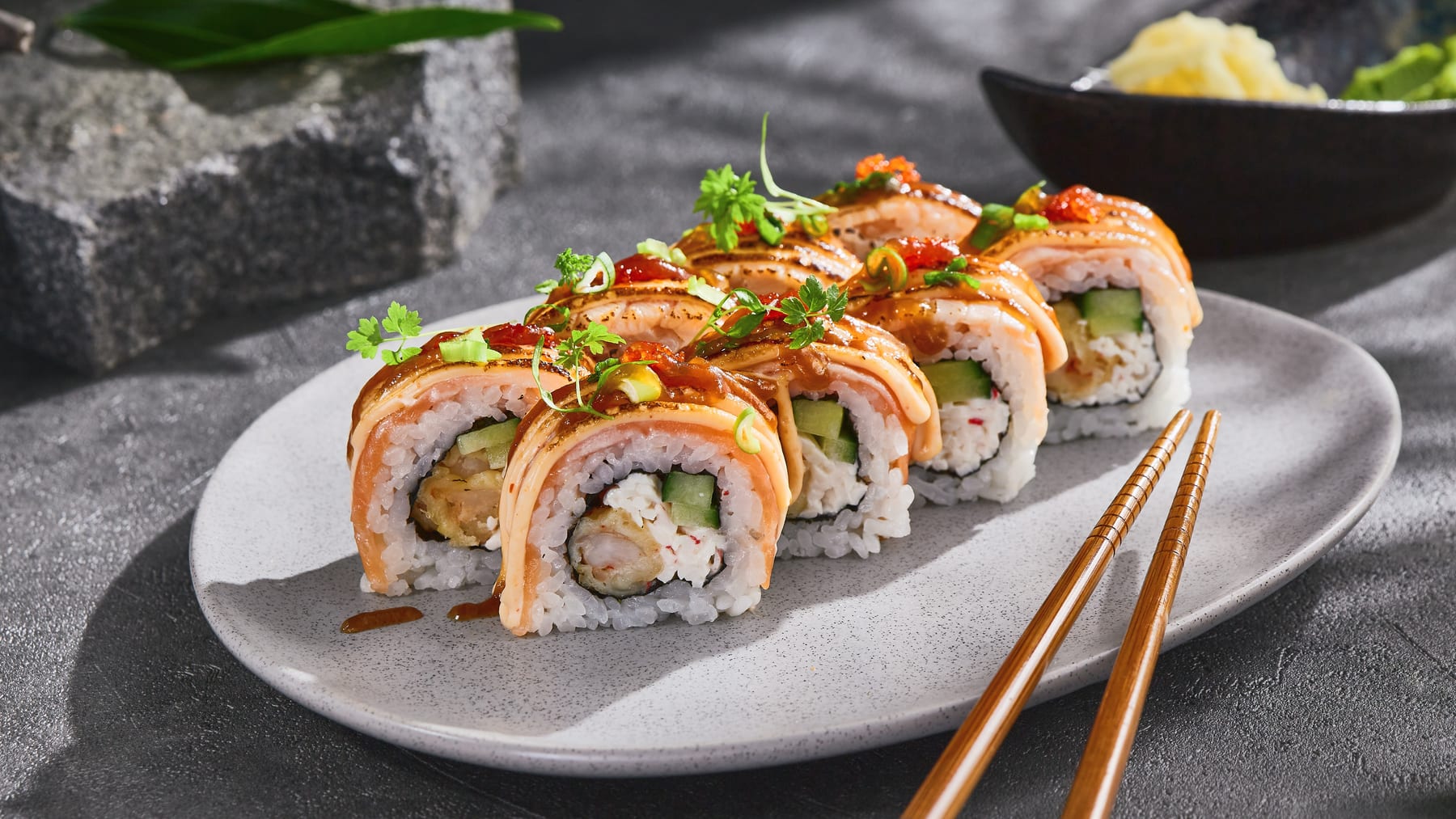 Sushi on a dark plate