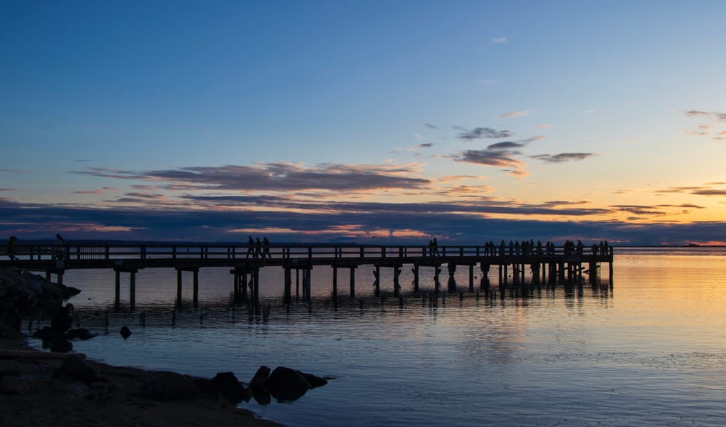 Sandy beach village shoreline