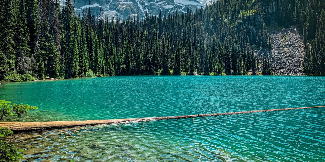 Turquoise alpine lake under peaks
