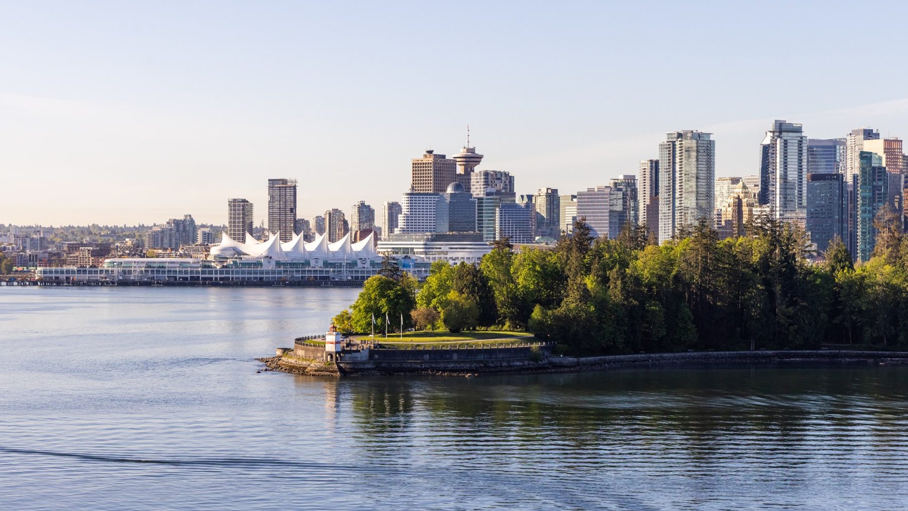 English Bay and the West End skyline at sunset from the air