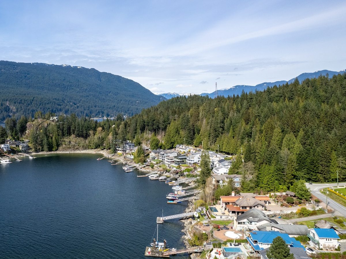 Sasamat Lake dock and forested shore in Belcarra Regional Park